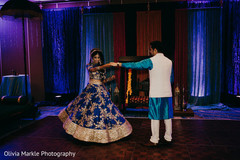 Spirited Indian couple sangeet shot. Spirited Indian couple sangeet shot.