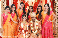 Adorable Indian bride and groom with their bridal party. Adorable Indian bride and groom with their bridal party.