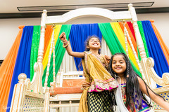 Colorful sangeet stage draping. sangeet,pre-wedding celebration,garba,floral and decor