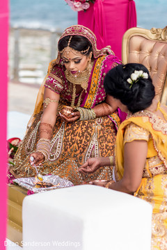 Indian bride's pre-wedding ritual. Indian bride's pre-wedding ritual.