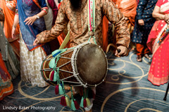 Dhol player. Dhol player.