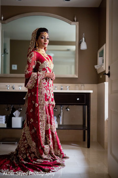 Indian bride glowing in her wedding attire. Indian bride glowing in her wedding attire.