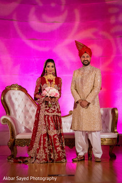 Lovely indian couple at their wedding reception. Lovely indian couple at their wedding reception.