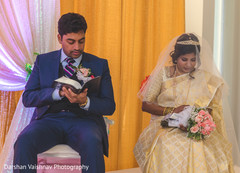 Lovely maharani and maharajah during wedding ritual Lovely maharani and maharajah during wedding ritual