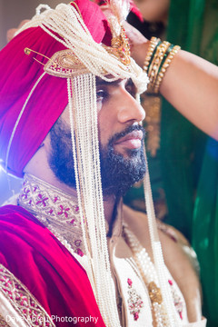 Charming indian groom at his wedding ceremony Charming indian groom at his wedding ceremony