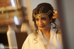Indian bride getting her hair done Indian bride getting her hair done