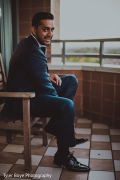 Charming indian groom getting ready scene Charming indian groom getting ready scene
