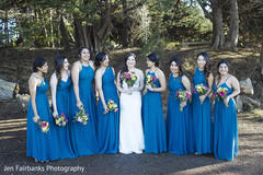 Glamorous indian bride posing with bridesmaids Glamorous indian bride posing with bridesmaids