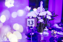 Graceful floral centerpiece and table number Graceful floral centerpiece and table number