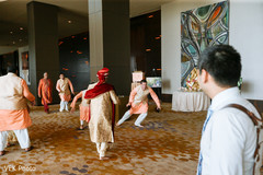 Joyful indian groomsman showing some dance moves Joyful indian groomsman showing some dance moves