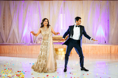 Joyful indian bride and groom dance Joyful indian bride and groom dance