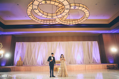 Lovely indian couple in their reception outfits Lovely indian couple in their reception outfits