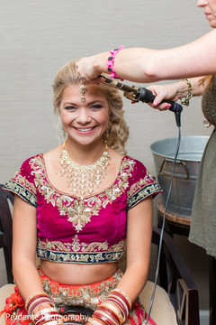 Indian bride getting her hair done indian wedding gallery,indian bride getting ready,indian bride hair and makeup,bridal jewelry