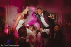 Indian bride and groom's fun moment indian wedding reception,indian wedding reception photography,indian bride and groom