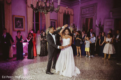 Sweet indian couple having their first dance indian wedding reception,indian wedding reception photography,indian bride and groom