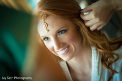 Indian bride getting her hair done Indian bride getting her hair done