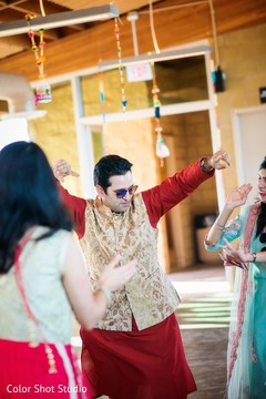 Indian groom during mehndi party Indian groom during mehndi party