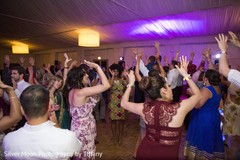 Indian wedding guests showing some dance moves Indian wedding guests showing some dance moves