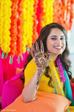 Lovely indian bride showing mehndi art Lovely indian bride showing mehndi art