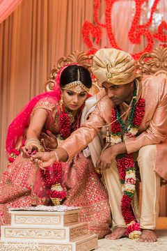 Elegant indian bride and groom at their wedding ceremony. Elegant indian bride and groom at their wedding ceremony.