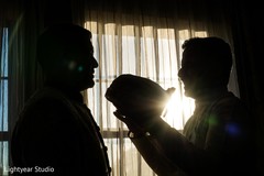 Indian groom getting ready silhouette Indian groom getting ready silhouette