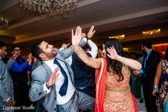 Indian wedding guests dancing Indian wedding guests dancing