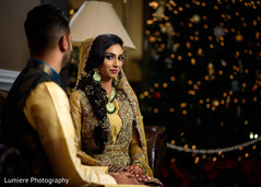 Indian groom admiring beautiful bride. indian bride and groom,indian wedding fashion,indian wedding hair and makeup