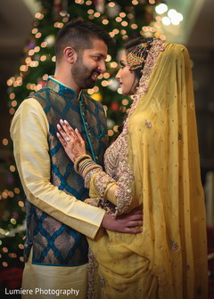 Lovely bride and groom looking into each others. indian bride and groom,indian wedding fashion,indian wedding hair and makeup,indian wedding jewelry
