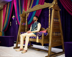 Indian groom waiting for bride at the sangeet celebration. indian groom,indian groom fashion,indiana sangeet mandap