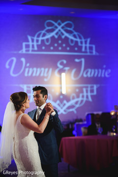 Indian lovebirds having their first dance. indian wedding reception,indian wedding reception photography,indian bride and groom