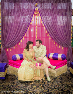 Indian couple during their sangeet Indian couple during their sangeet