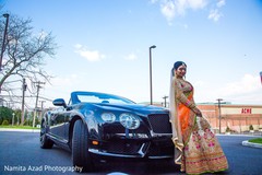 Indian Bride on ceremony gown posing outdoors. inidan bride,indian wedding fashion,indian ceremony anarkali