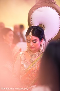 Glamorous indian bride during wedding ritual. indian bride,indian bride ceremony fashion,indian bride jewelry,indian bride hair and makeup
