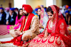 Adorable Indian bride and groom at the wedding ceremony.