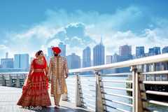 Joyful Indian bride and groom holding hands capture. Joyful Indian bride and groom holding hands capture.