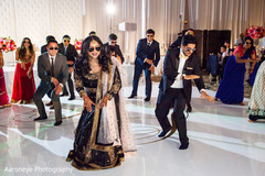 Indian bride and groom dancing along with the guests anarkali,indian wedding dj,choreography