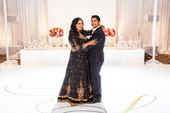 Beautiful indian couple at the dance floor indian wedding,bridal anarkali,suit