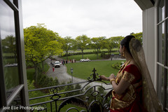 Indian bride looking the baraat celebration Indian bride looking the baraat celebration