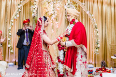 Indian bride and groom exchanging garlands ceremony. Indian bride and groom exchanging garlands ceremony.