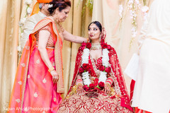 Indian bride and family member at her wedding ceremony. indian bride,indian wedding ceremony,indian wedding fashion