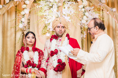 Gorgeous Indian bride and groom during their ceremony celebration. Gorgeous Indian bride and groom during their ceremony celebration.