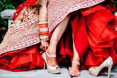 Fabulous Indian bride getting her shoes on capture. bridal shoes,indian bride shoes,indian bride jewelry,indian bride golden shoes