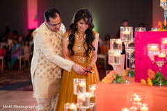 Indian lovebirds lighting candles Indian lovebirds lighting candles