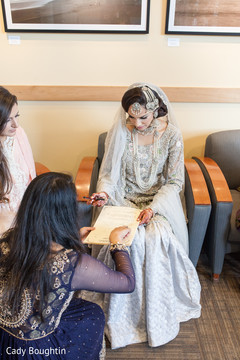 Indian bride signing wedding contract Indian bride signing wedding contract