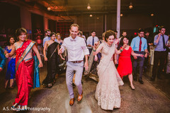 Indian couple leading the dance floor indian wedding,sari,dj
