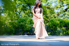 Dazzling Indian bride walking outdoors. Dazzling Indian bride walking outdoors.
