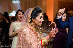 Indian bride enjoying her wedding celebration with friends. Indian bride enjoying her wedding celebration with friends.