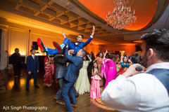 Joyful Indian groom and groomsmen dance performance. Joyful Indian groom and groomsmen dance performance.
