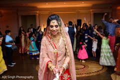 Joyful bride about to throw the wedding bouquet. Joyful bride about to throw the wedding bouquet.