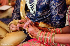 Indian bride putting groom's ring on indian wedding,indian bride jewelry